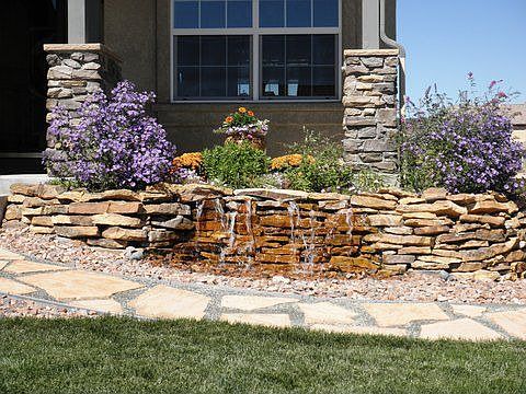 Over 40K in Cutom Landscaping Includes 2 Water Features...
