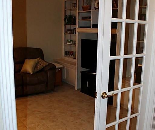  Upon entering, to your left you find the Formal Living Room