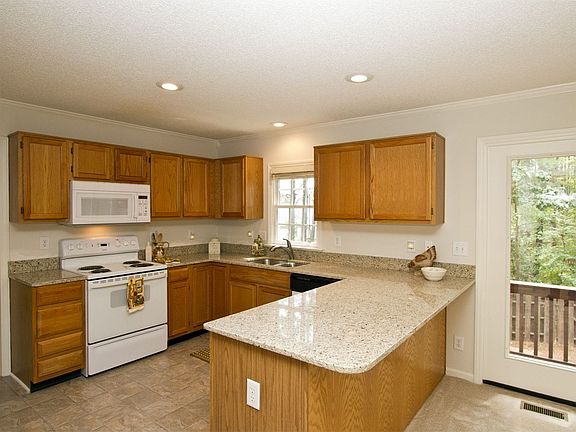 A New undermount, deep sink w/new pull out faucet is for those big pasta pots 