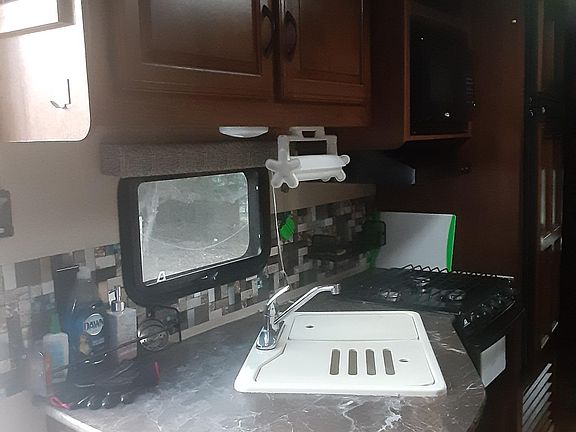 kitchen is efficient and easy to clean. lots of storage.