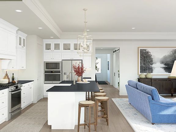 Kitchen with quartz island and countertops
