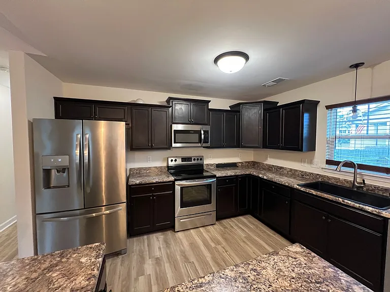 310 Landon Ln — Photo 37