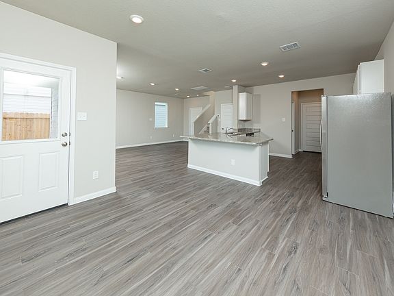Dining Area to Kitchen and Family Room