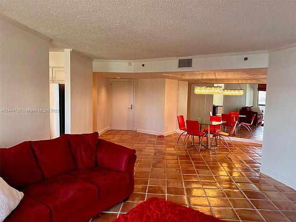 5th image of 3600 Mystic Pointe Dr APT 715