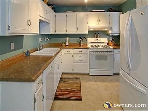 Kitchen with new countertops and newer appliances