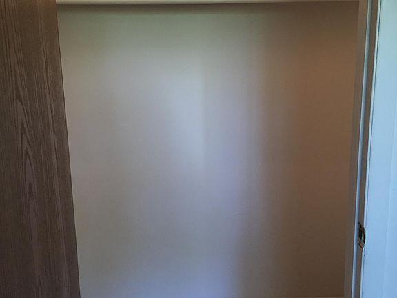 Walk-in closet in bedroom