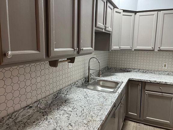 pantry with new backsplash, countertop & sink
