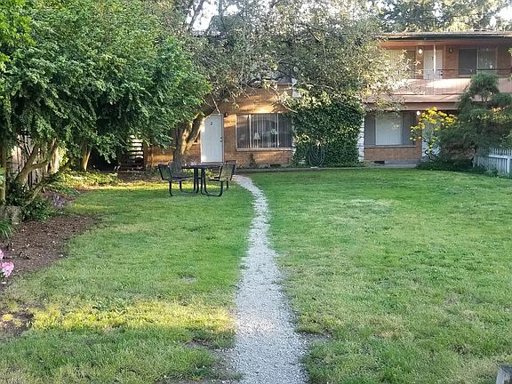 Pathway and patio table outside apt #2