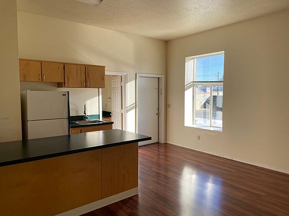 Kitchen and entry with lots of natural light.