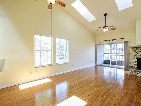 Living room w/ fireplace.