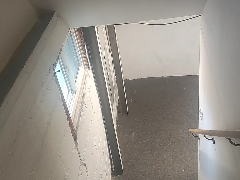 stairs from side door to basement