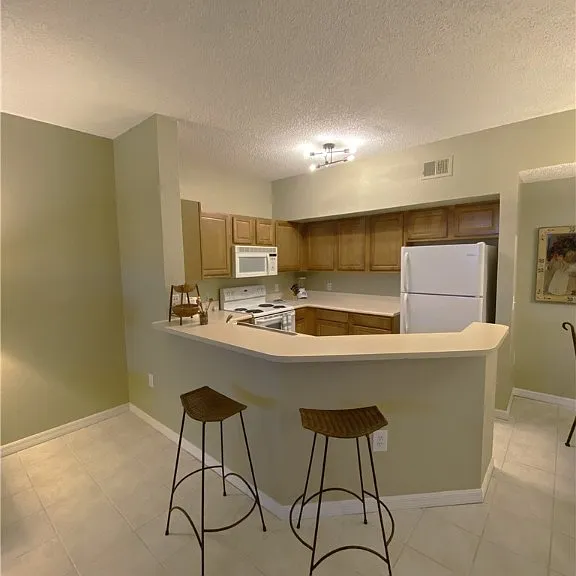 15585 Ocean Walk Cir #302 — Photo 18