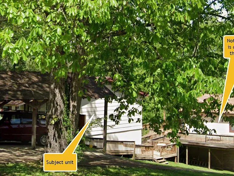 Separate Unit in rear: Not included. The deck attached but separated by a gate. The driveways are separate. They also share back yard.
