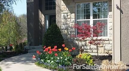 Beautiful Spring Showing in Front Flower Beds