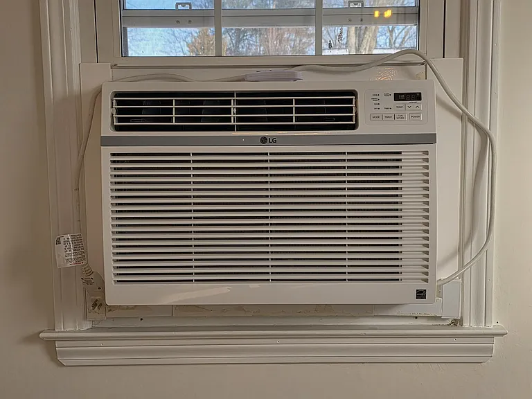 15k btu window AC in living area