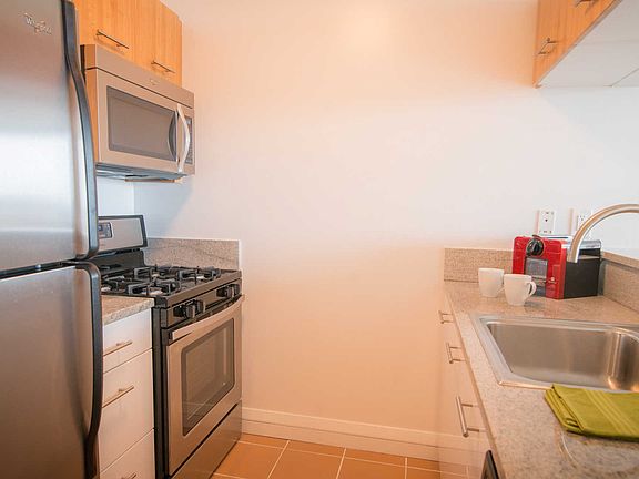 Kitchen with Granite Countertops and Stainless Steel Applian