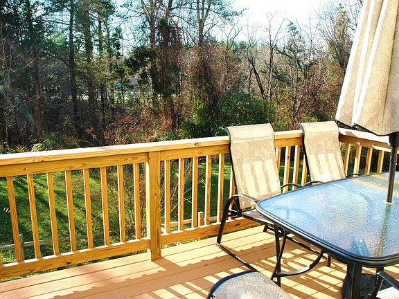 Deck overlooking wooded back yard