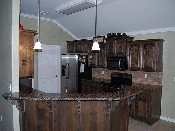 Kitchen with granite counter