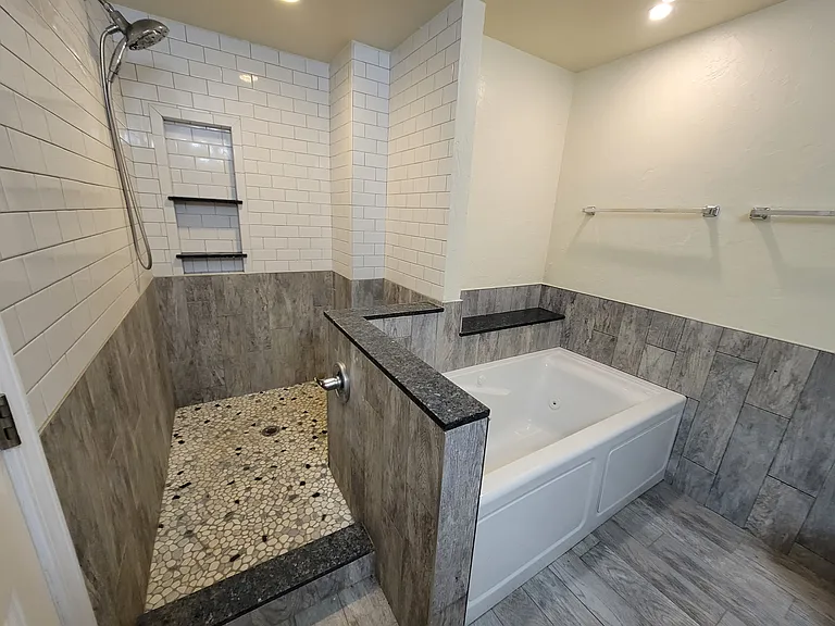 Master bathroom with tub and shower.