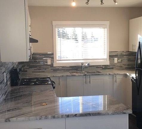 5th image of 7619 135a Ave NW