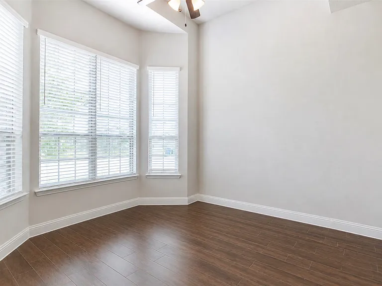 First floor bedroom next to full bath or office