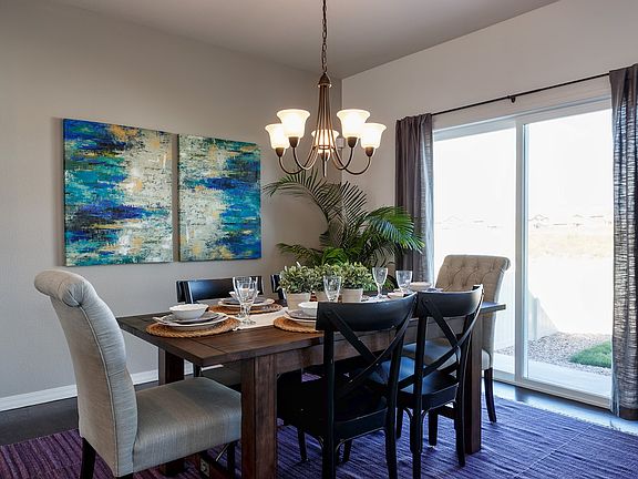Spacious dining nook connected to the kitchen, great for family gatherings Model of home TBB