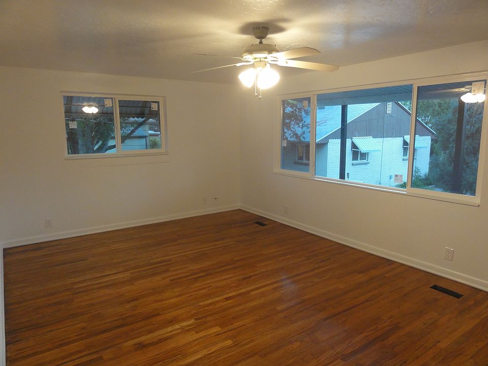 Living room, hardwood floors, big windows