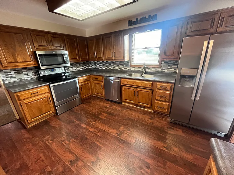 14907 Rohman Rd — Photo 14