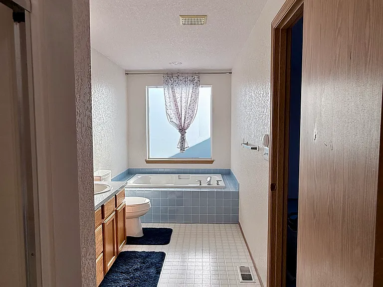 Master's Bathroom with tub and shower