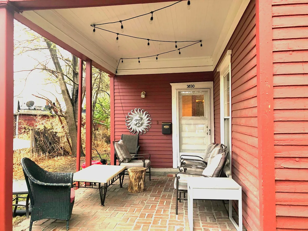 Welcoming sheltered sunny front porch - 3830 Bell St