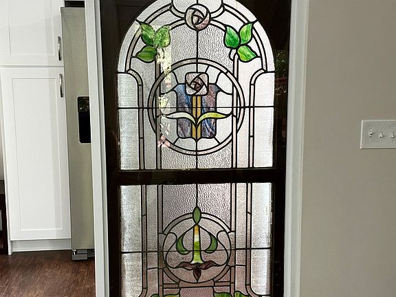 Stained glass kitchen wall.