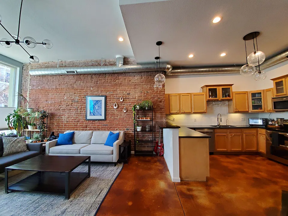 View of living room and kitchen