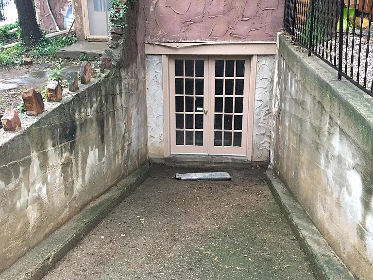 Entrance to downstairs office, bathroom, laundry room and st
