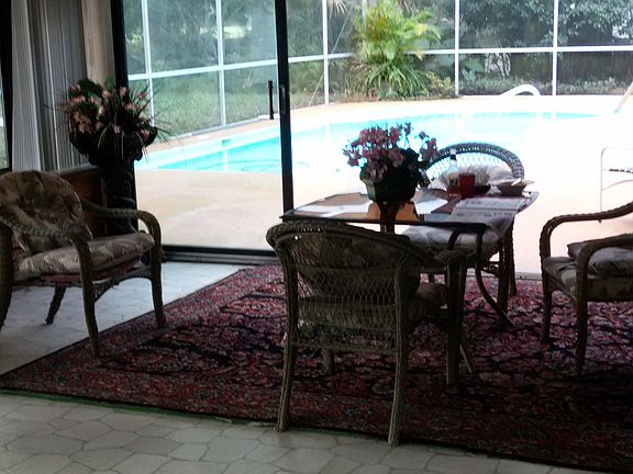 Fl.  room overlooking pool