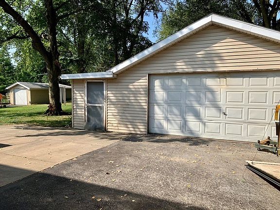 The larger garage has a work room attached.  Both are heated.