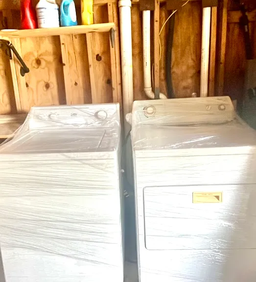 Your own laundry with recently purchased washer dryer set! Ample storage. 

Please note garage floor isn't concrete. Just the washer dryer station is concrete.