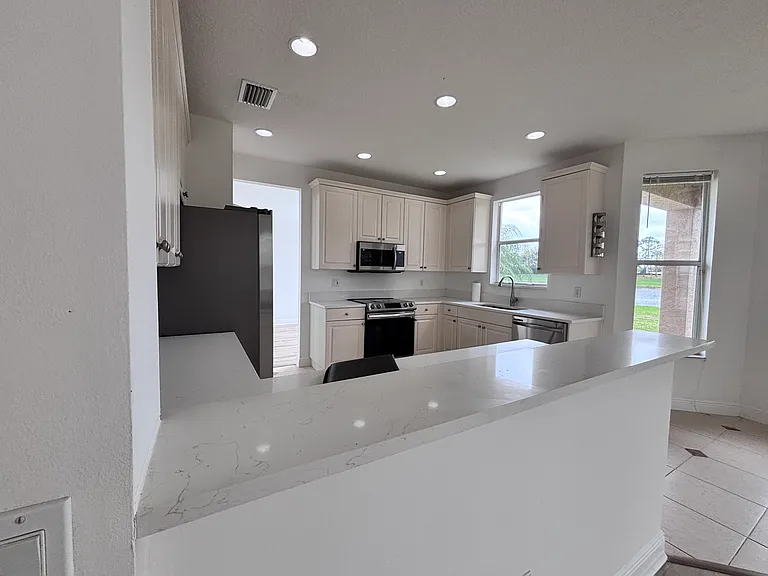 Kitchen- Brand new Quartz Countertops Brand New SS Appliances - Upgrade