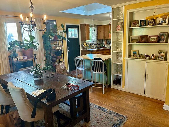 View from dining room to kitchen with skylight