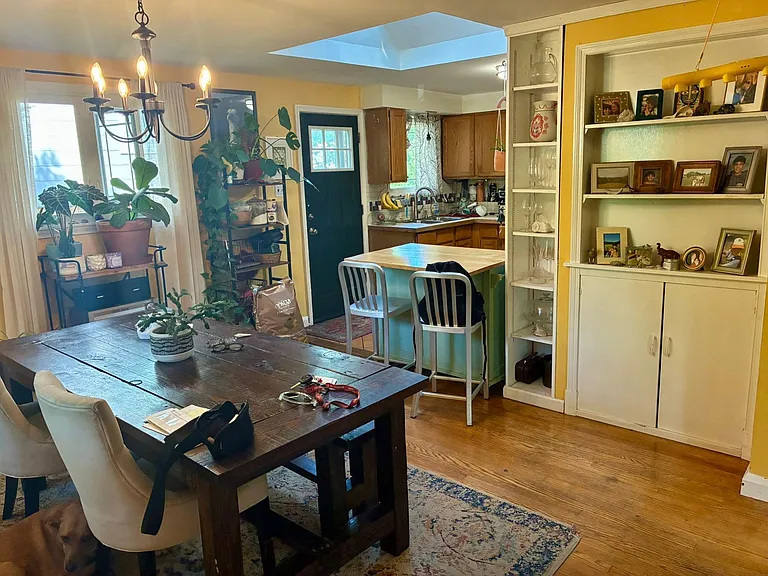 View from dining room to kitchen with skylight