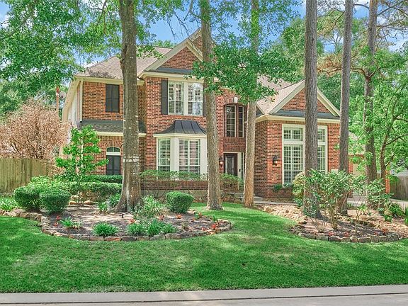 This David Weekley built home has great curb appeal and sits on elevated to the street.