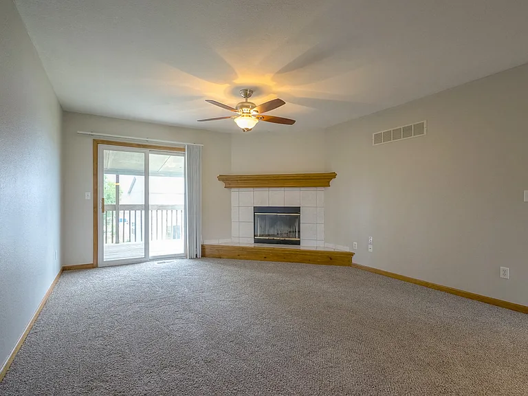 Living room with wood burning fireplace