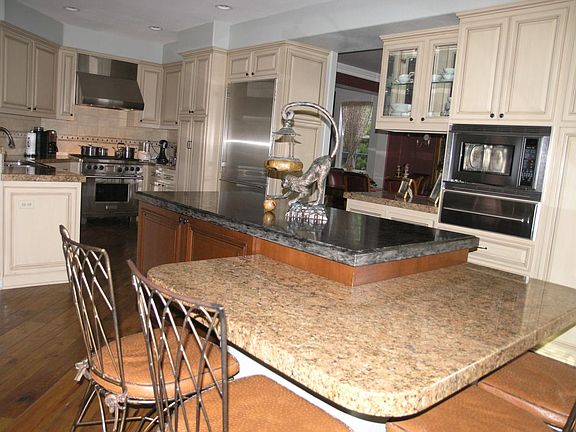 kitchen and built in granite kitchen seating