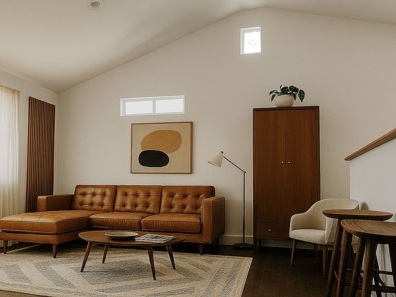 Staged photo of the living room, for visualization purposes only.