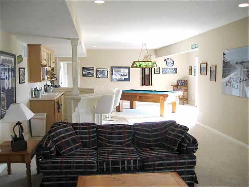 Amazing walk out lower level features recreation room with wetbar, fireplace. 