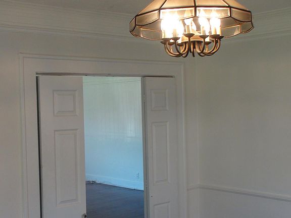 French doors leading from living room to dining room (sometimes used as office or 4th bedroom).