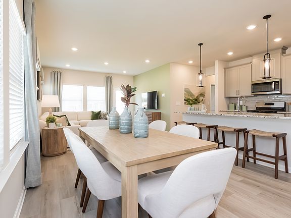 Dining area in the Roswell floorplan at a Meritage Homes community in Atlanta, GA.