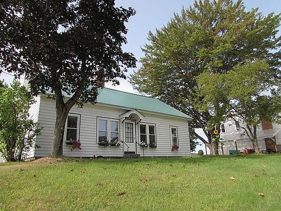 front lawn and red maples