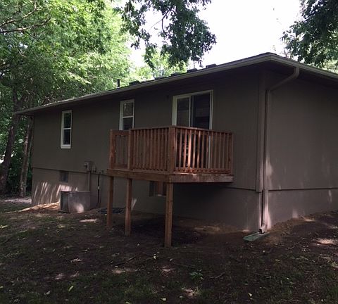 Back of house and deck. 