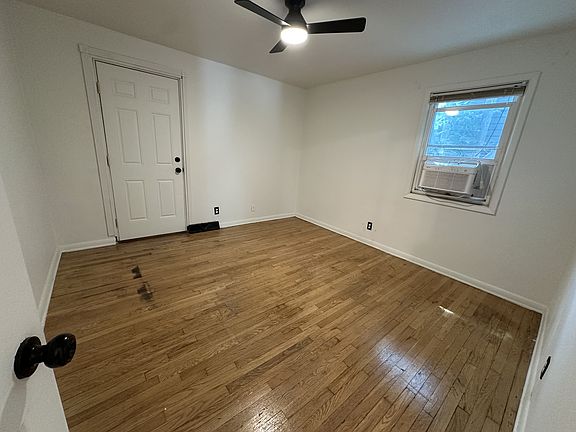 Master Bedroom with direct access to the sunroom and backyard.