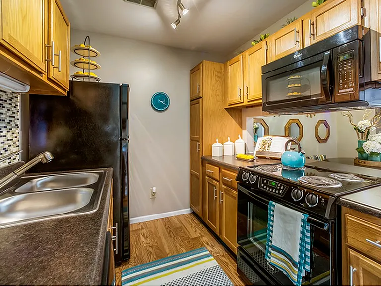 Galley Style Kitchen with Upgraded Appliances